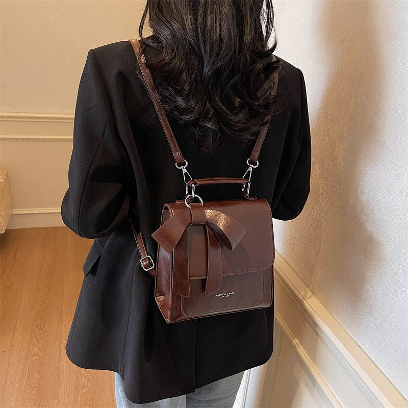 Compact Vegan Leather Backpack with Bow Design