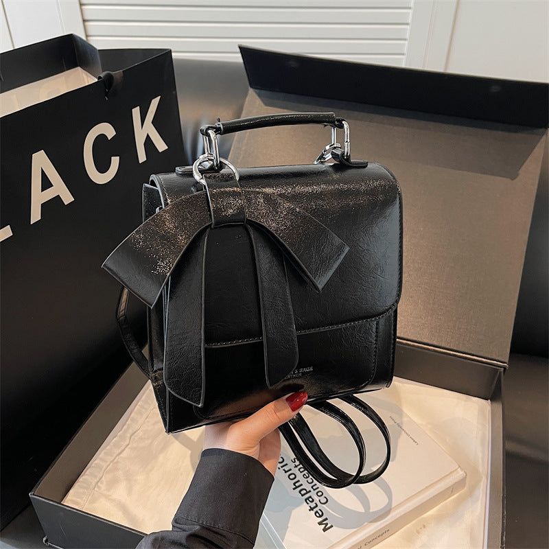 Compact Vegan Leather Backpack with Bow Design