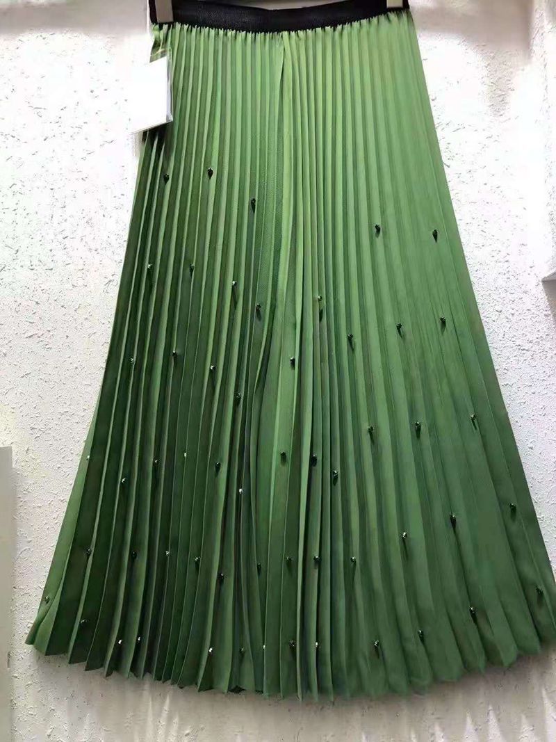 Chic Mid‑Length A‑Line Skirt with Pleats and Beaded Accent