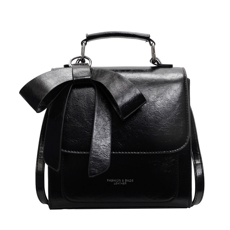 Compact Vegan Leather Backpack with Bow Design