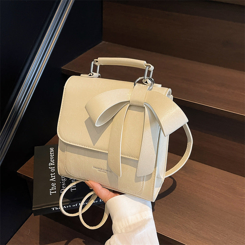 Compact Vegan Leather Backpack with Bow Design