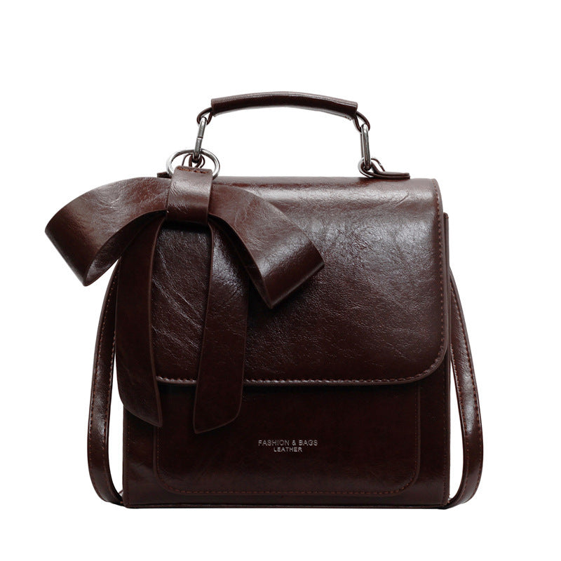 Compact Vegan Leather Backpack with Bow Design